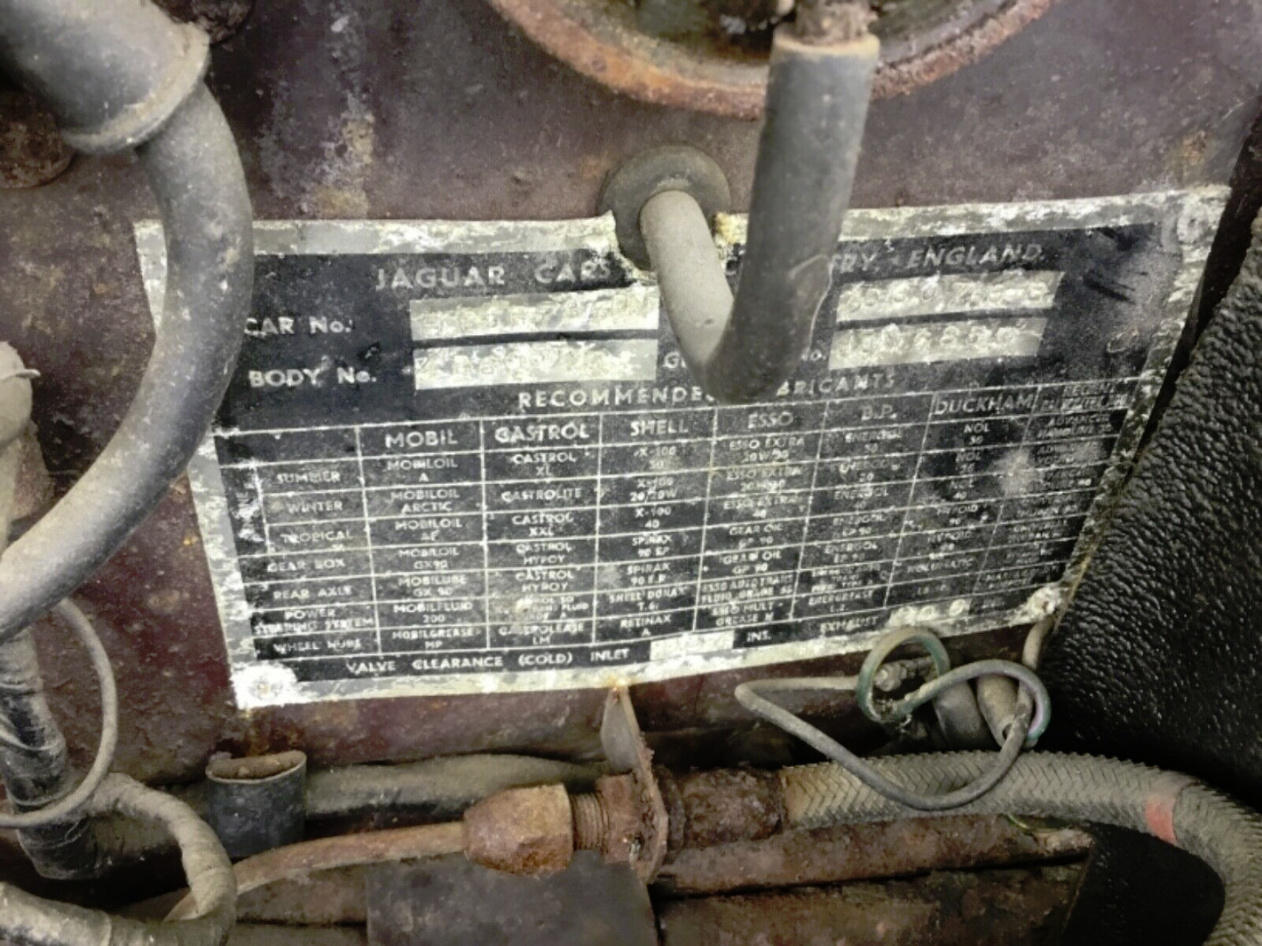 1966 hose at rear of engine bay.jpg